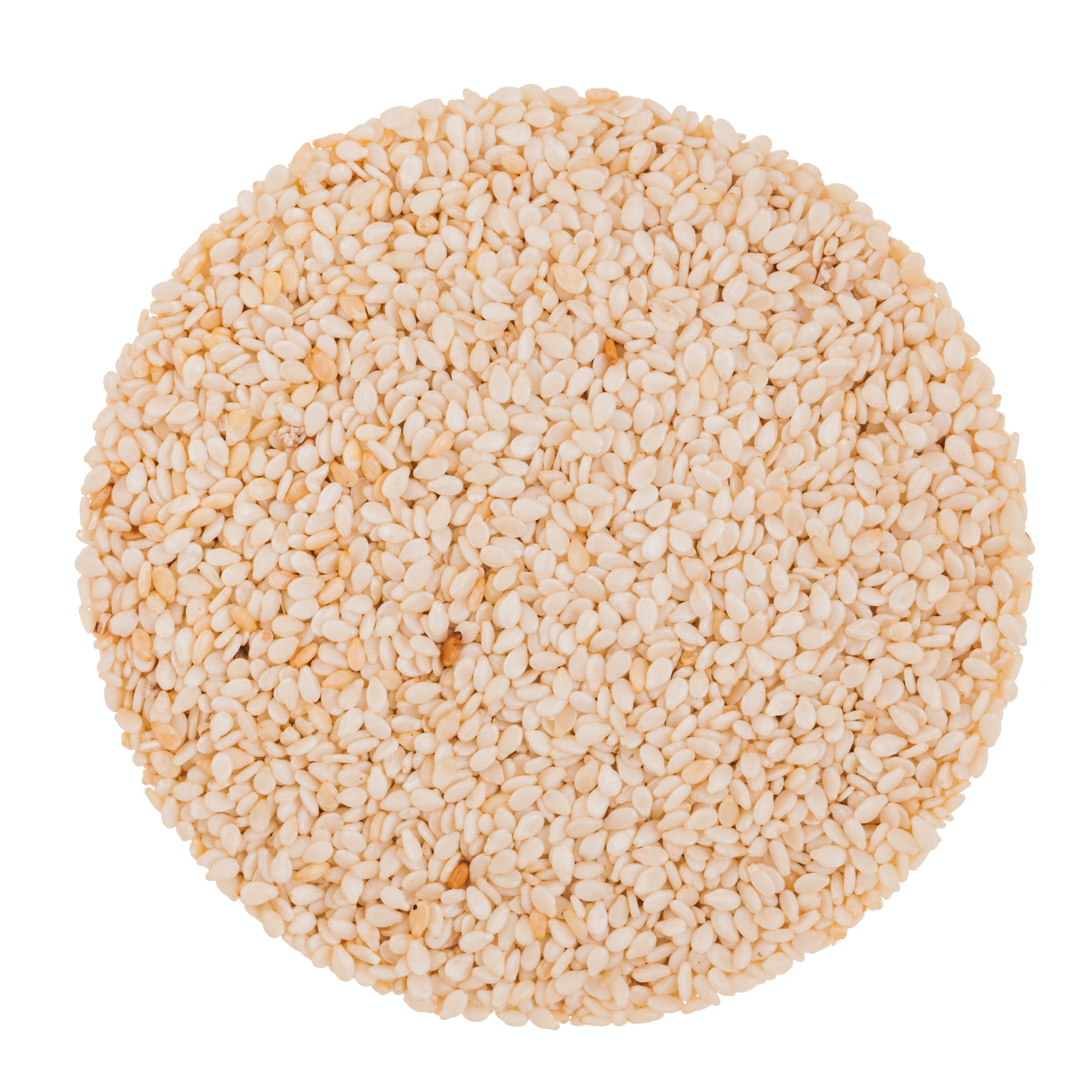 Closeup of Sesame Seeds Isolated On White